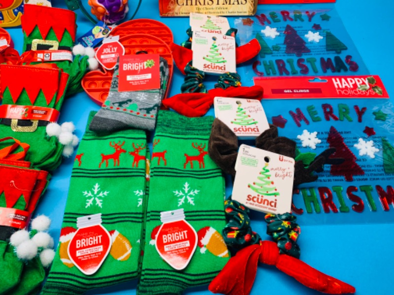 Photo 3 of 988239…Christmas and holiday items- socks, fidgets, books, and more