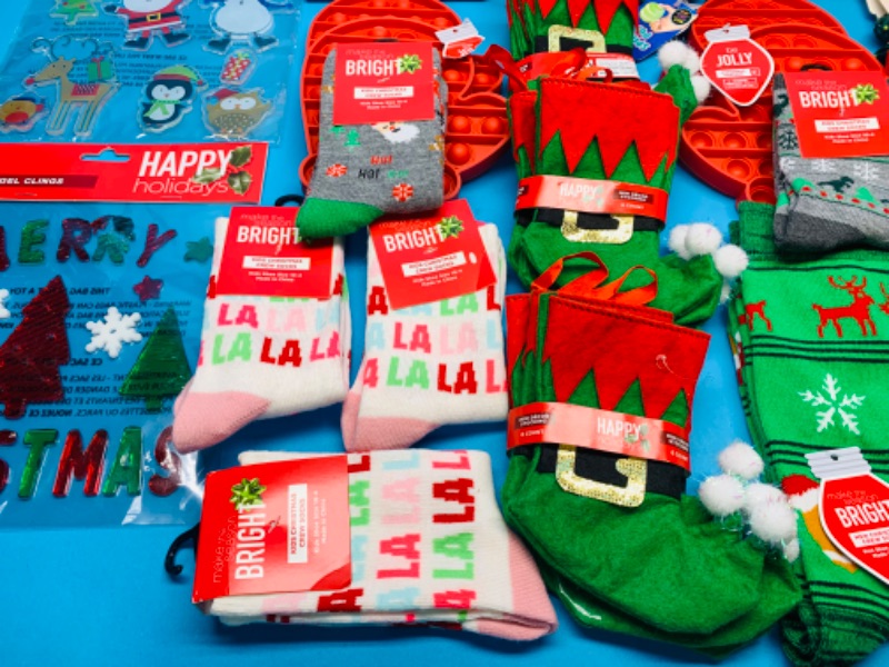 Photo 2 of 988239…Christmas and holiday items- socks, fidgets, books, and more