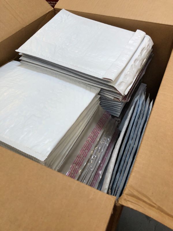 Photo 1 of Amazon Basics Poly Bubble Mailer, 8.5" x 12", White,100-Pack & Poly Bubble Mailer, 6" x 10" (Internal Size - 5.75" x 9"), White, 50-Pack