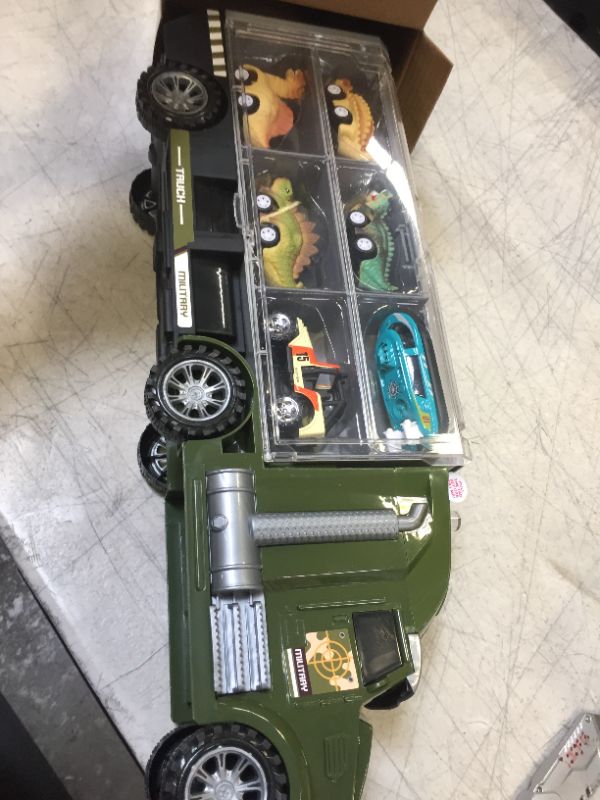 Photo 2 of DINOSAUR METAL TRUCK 