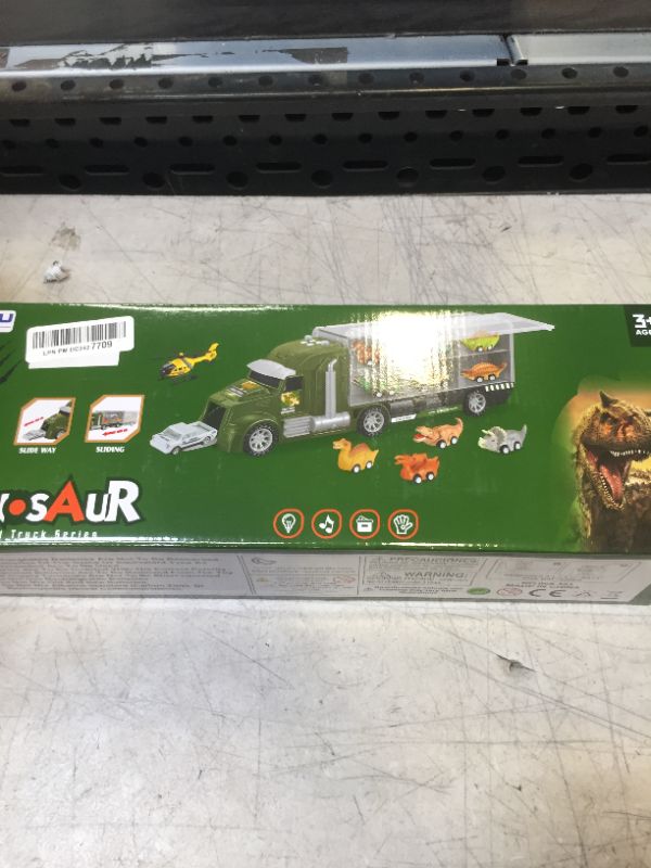 Photo 1 of DINOSAUR METAL TRUCK 