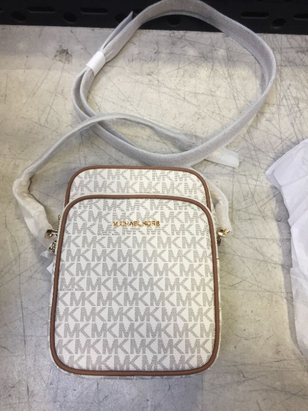 Photo 3 of Michael Kors Jet Set Travel Signature PVC Medium Logo Chain Crossbody Flight Bag Vanilla