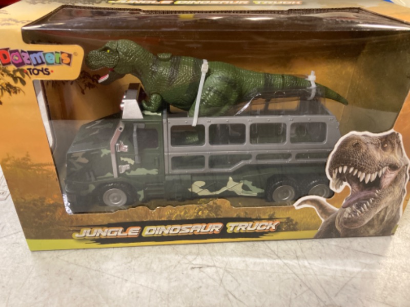 Photo 2 of BUILD ME Dinosaur Transport Truck Toy Die-Cast Jurassic World Transporter Jungle Truck and 9 Inch Tall Tyrannosaurs Rex Dinosaur Toy. Fun Dinosaur Playset