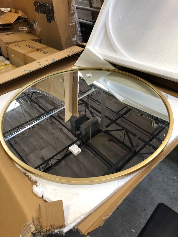 Photo 1 of 30" round gold framed mirror