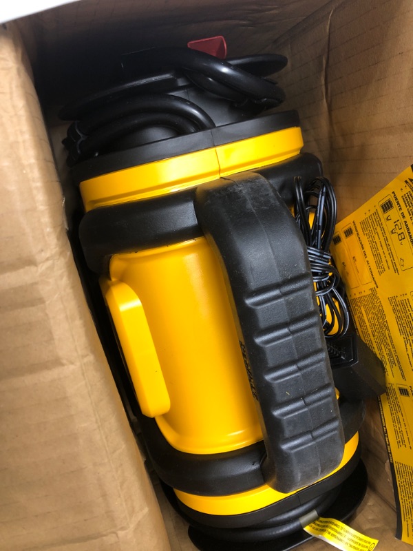 Photo 1 of DEWALT DXAEPS14 1600 Peak Battery Amp 12V Automotive Jump Starter/Power Station with 500 Watt AC Power Inverter, 120 PSI Digital Compressor, and USB Power , Yellow