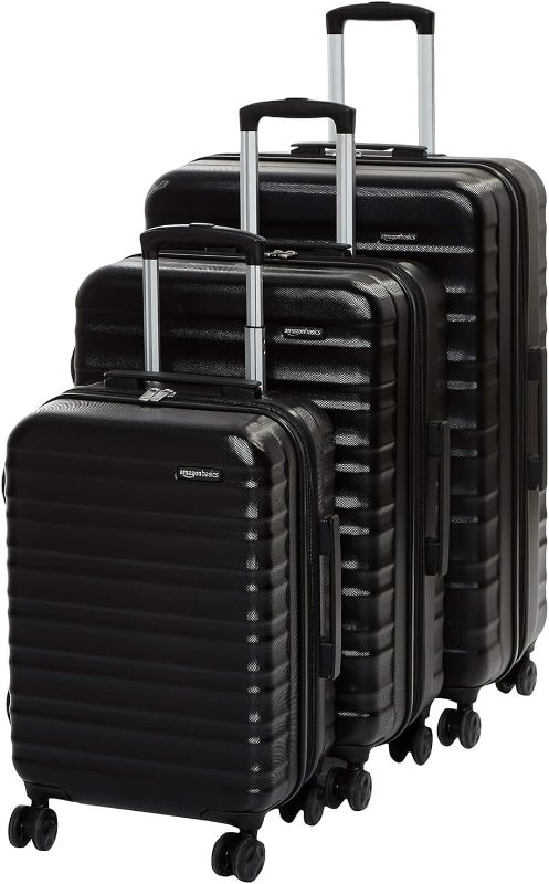 Photo 1 of https://www.amazon.com/AmazonBasics-Hardside-Spinner-Luggage-Piece/dp/B0713ZQ4DQ/ref=asc_df_B0713ZQ4DQ/?tag=hyprod-20&linkCode=df0&hvadid=198115857567&hvpos=&hvnetw=g&hvrand=12646635436705312796&hvpone=&hvptwo=&hvqmt=&hvdev=c&hvdvcmdl=&hvlocint=&hvlocphy=