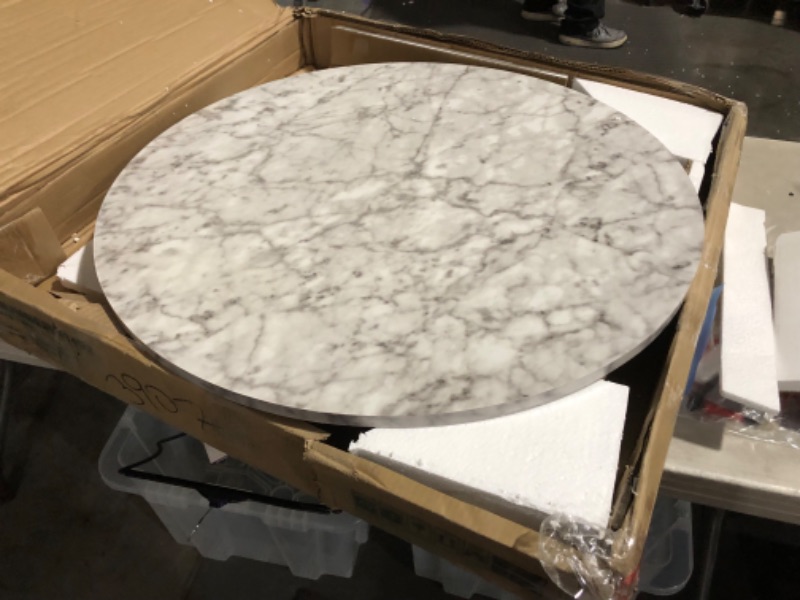 Photo 5 of ***DAMAGED - TABLETOP CHIPPED AND CRACKED - SEE PICTURES - MIGHT BE MISSING PARTS***
Nathan James Amalia Round Bistro Dining Table with Legs in Tan Wood Finish and Faux White Carrara Marble Top