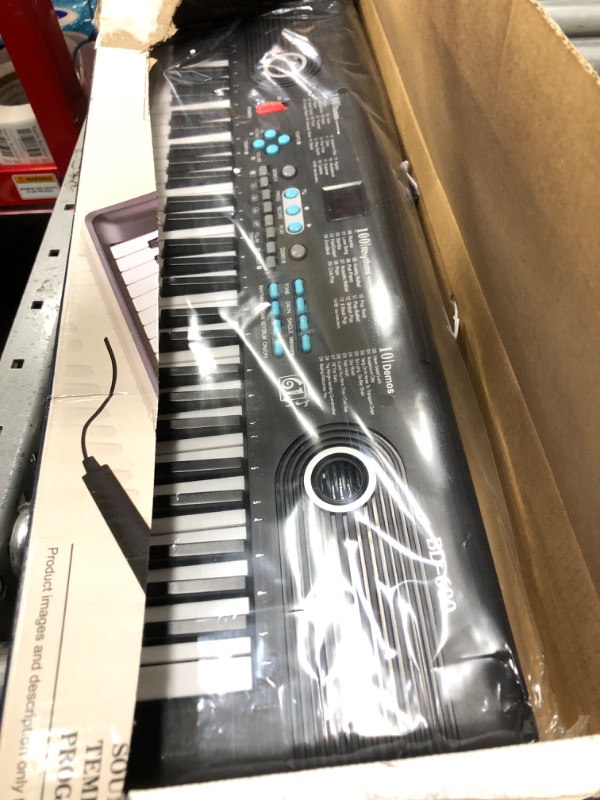 Photo 1 of ***MISSING PIECES/ NON-RETURNABLE**MISSING POWER CORD AND MICROPHONE***
61 keys keyboard piano, Electronic Digital Piano with Built-In Speaker