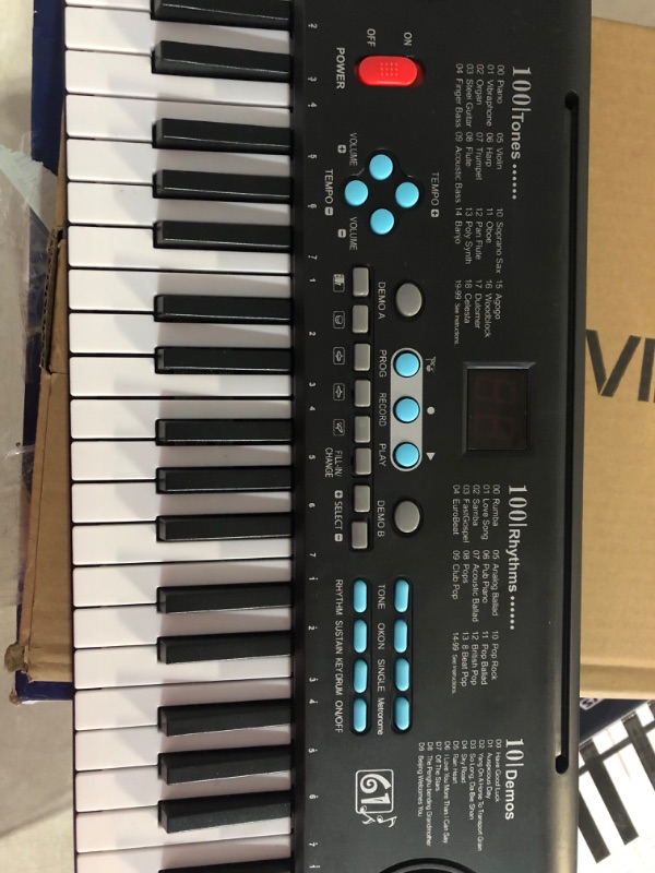 Photo 2 of ***MISSING PIECES/ NON-RETURNABLE**MISSING POWER CORD AND MICROPHONE***
61 keys keyboard piano, Electronic Digital Piano with Built-In Speaker