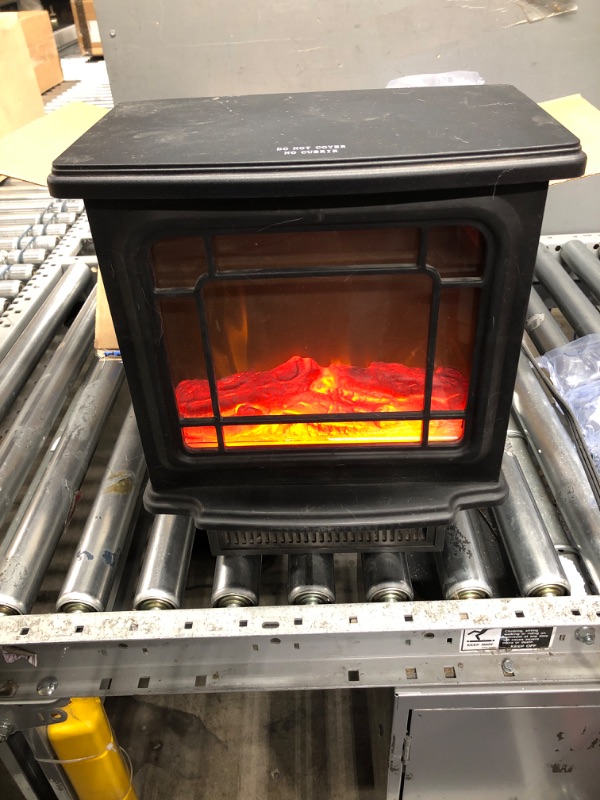 Photo 2 of * used * powers on *
Electric Fireplace Heater, 3D Simulated Flame Effects Room Heater, Adjustable Brightness and Heating Mode