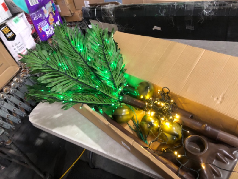 Photo 3 of ***USED - LIGHTS IN UPPER PART OF TREE DON'T LIGHT UP - SEE PICTURES***
8FT LED Lighted Palm Tree with 5 Coconuts, Artificial Tropical Palm Tree Light Indoor Outdoor, Green Fake Palm Tree Lights for Outside Patio Pool Summer Hawaiian Luau Party Tiki Bar H