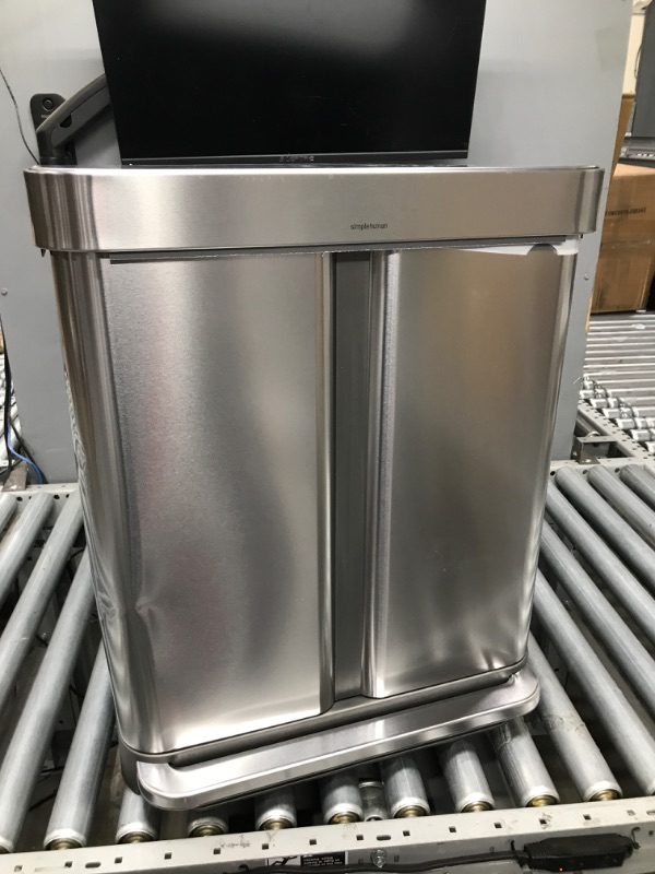 Photo 2 of *****MINOR DAMAGE*****
simplehuman 58 Liter / 15.3 Gallon Rectangular Hands-Free Dual Compartment Recycling Kitchen Step Trash Can with Soft-Close Lid, Brushed Stainless Steel Brushed Stainless Steel 58 Liter Rectangular Recycler Trash Can