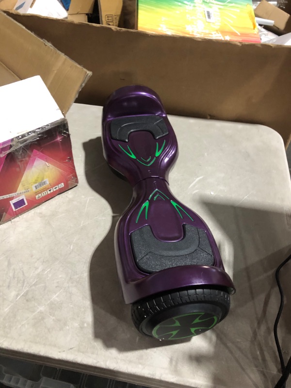 Photo 5 of ***USED - NO CHARGER - UNABLE TO TEST***
Bluetooth Hoverboard with Pearl Skin, 6.5" Self Balancing Scooter with Wireless Speaker for Music, with LED Light up Pedal and Wheels for Funs Purple