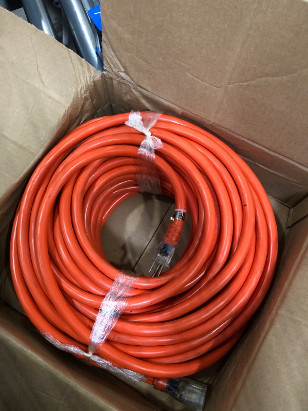 Photo 2 of Iron Forge Cable 100 Foot Lighted Outdoor Extension Cord - 10/3 SJTW Orange 10 Gauge Extension Cable with 3 Prong Grounded Plug for Safety, 15 AMP - Great for Garden and Major Appliances 100 Foot Orange