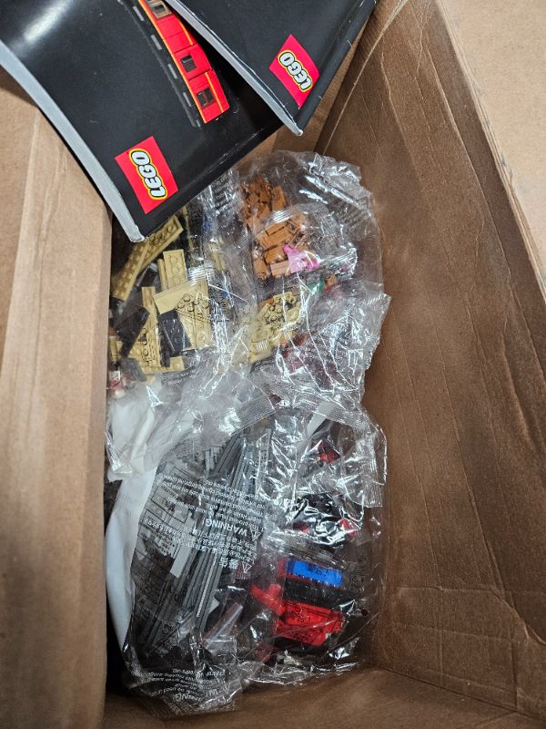 Photo 2 of ***PARTS ONLY/NON-RETURNABLE*MISSING PIECES **USED DAMAGED BOX MISSING PIECES***
LEGO Harry Potter Hogwarts Express 76405 Building Set **There are 10 empty bags inside with no loose Legos and three bags missing**