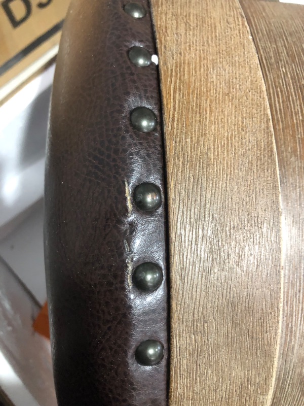 Photo 5 of ***DAMAGED - SEAT HAS A CUT IN IT - SEE PICTURES - HARDWARE LOOSE AND POSSIBLY MISSING***
Ashley Signature Design Pinnadel Swivel Barstool, Brown