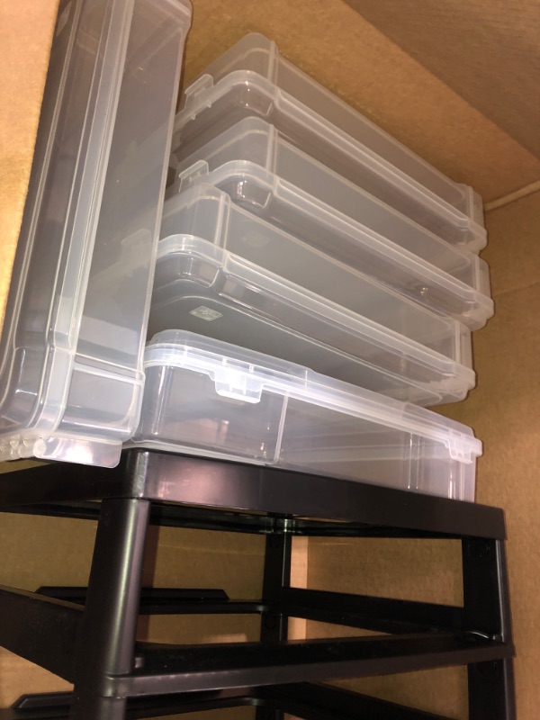 Photo 1 of clear bin shelf with 6 slots for storage 