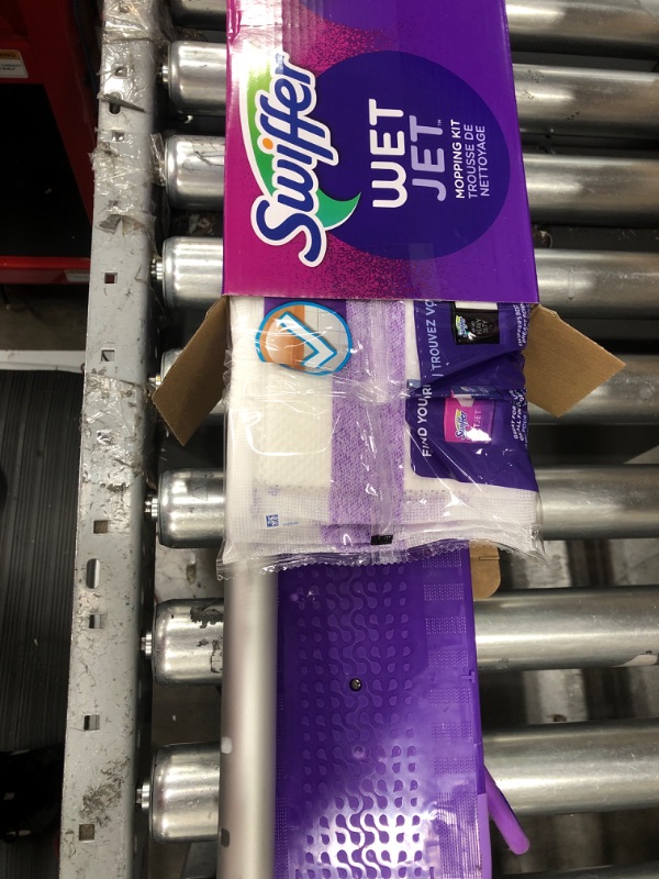 Photo 1 of Swiffer WetJet Starter Kit and Heavy Duty Refill Cleaning Bundle