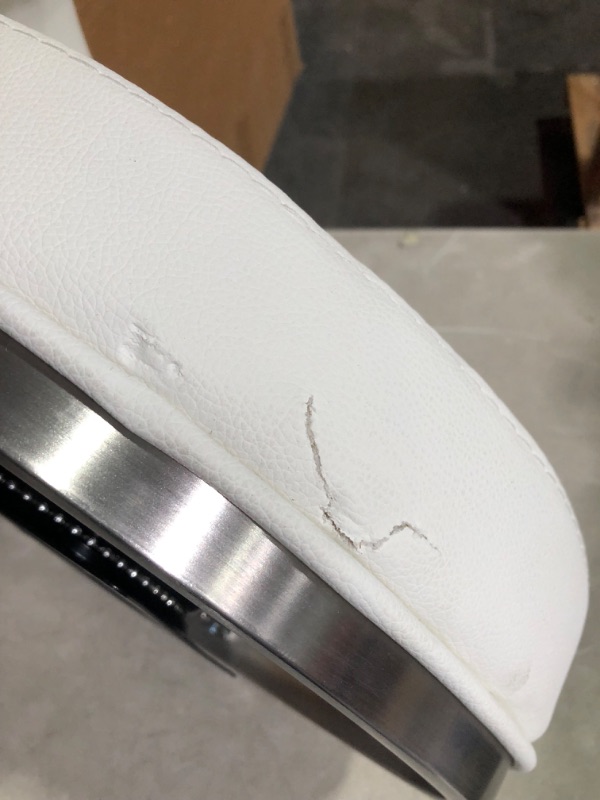 Photo 3 of ***DAMAGED - VINYL TORN ON SIDE - SEE PICTURES - LIKELY MISSING PARTS***
Armen Living Madrid 26" Counter Height Swivel White Faux Leather and Brushed Stainless Steel Bar Stool 26" Counter Height White
