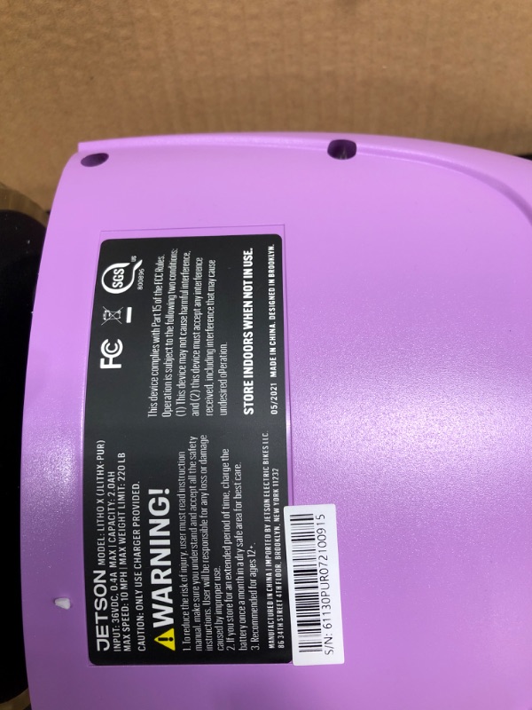 Photo 2 of **MAJOR DAMAGE TO CHARGER NON FUNCTIONAL**
Jetson All Terrain Light Up Self Balancing Hoverboard up to 220lbs Purple