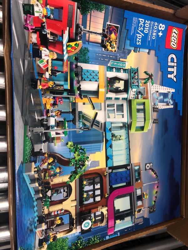 Photo 1 of LEGO City Downtown 60380 Building Toy Set, Multi-Feature Playset with Connecting Room Modules, Includes 14 Inspiring Minifigure Characters and a Dog Figure, Sensory Toy for Kids Ages 8+