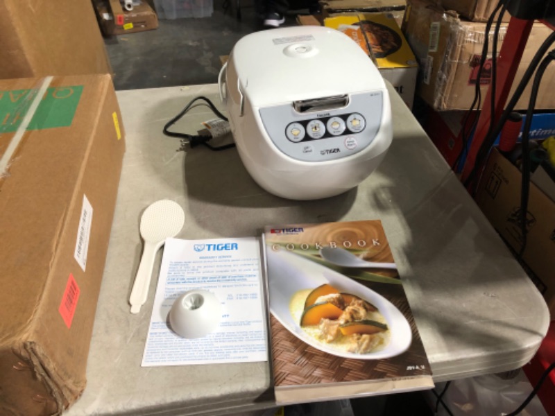 Photo 8 of ***USED - DAMAGED - SEE COMMENTS***
TIGER JBV-A10U 5.5-Cup (Uncooked) Micom Rice Cooker with Food Steamer Basket, White