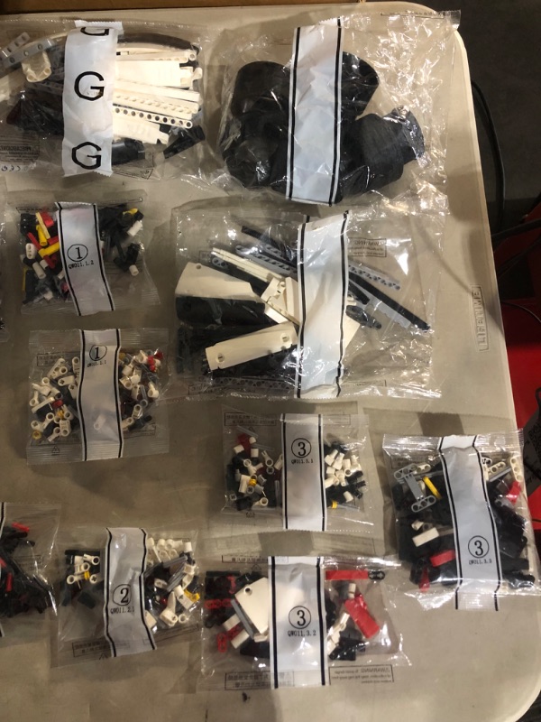 Photo 9 of ***OPENED BOX*ALL ENCLOSED BAGS ARE SEALED*INSTRUCTIONS OPENED***
LEGO Technic Porsche 911 RSR Race Car Model Building Kit 42096, Advanced Replica, Exclusive Collectible Set, 