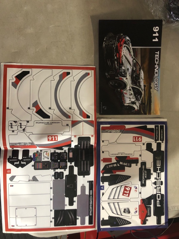 Photo 3 of ***OPENED BOX*ALL ENCLOSED BAGS ARE SEALED*INSTRUCTIONS OPENED***
LEGO Technic Porsche 911 RSR Race Car Model Building Kit 42096, Advanced Replica, Exclusive Collectible Set, 