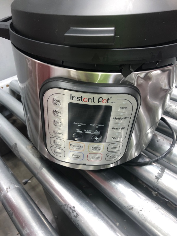 Photo 2 of **DENTED/POSSIBLY BROKEN** Instant Pot Duo 7-in-1 Electric Pressure Cooker, Slow Cooker, Rice Cooker, Steamer, Sauté, Yogurt Maker, Warmer & Sterilizer, Includes App With Over 800 Recipes, Stainless Steel, 8 Quart 8QT Duo
