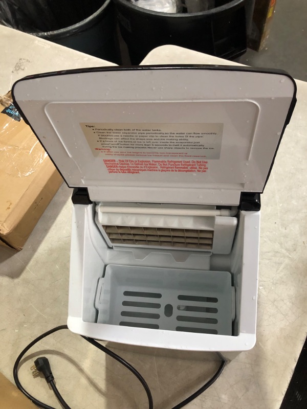 Photo 9 of ***NONREFUNDABLE - NOT FUNCTIONAL - FOR PARTS ONLY - SEE COMMENTS***
Newair Silver Countertop Ice Maker Machine, Compact Automatic Ice Maker, Cubes Ready in Under 15 Minutes, Portable Ice Cube Maker, Perfect for Home/Kitchen/Office/Bar