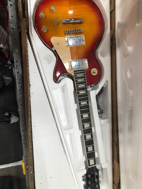 Photo 2 of Leo Jaymz 24.75" Single Cut Curved Top CherrySunburst Electric Guitar - Classic single cut top curved body - Mahogany Body and Neck?Ebony Fingerboard (Cherry SunBurst)