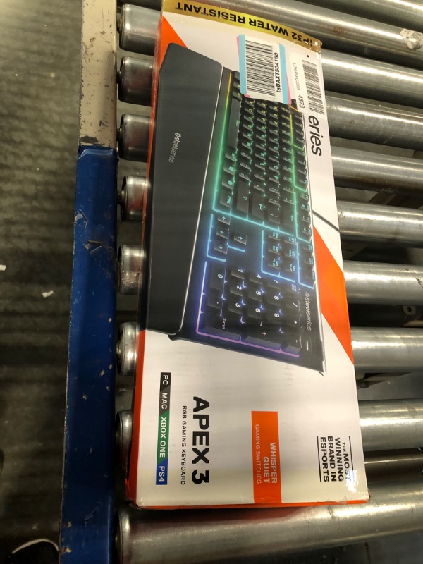 Photo 2 of SteelSeries Apex 3 RGB Gaming Keyboard – 10-Zone RGB Illumination – IP32 Water Resistant – Premium Magnetic Wrist Rest (Whisper Quiet Gaming Switch)
