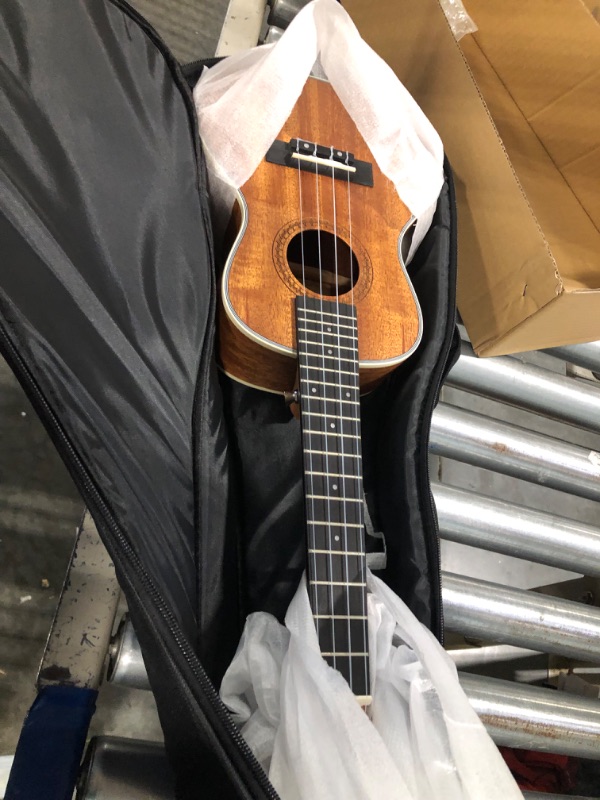 Photo 3 of Donner Concert Ukulele Beginner Kit 23 inch Ukelele Mahogany Wood with Free Online Lesson Gig Bag Strap Nylon String Tuner Picks Ukalalee Yukalalee Bundle Pack DUC-200 Concert Brown