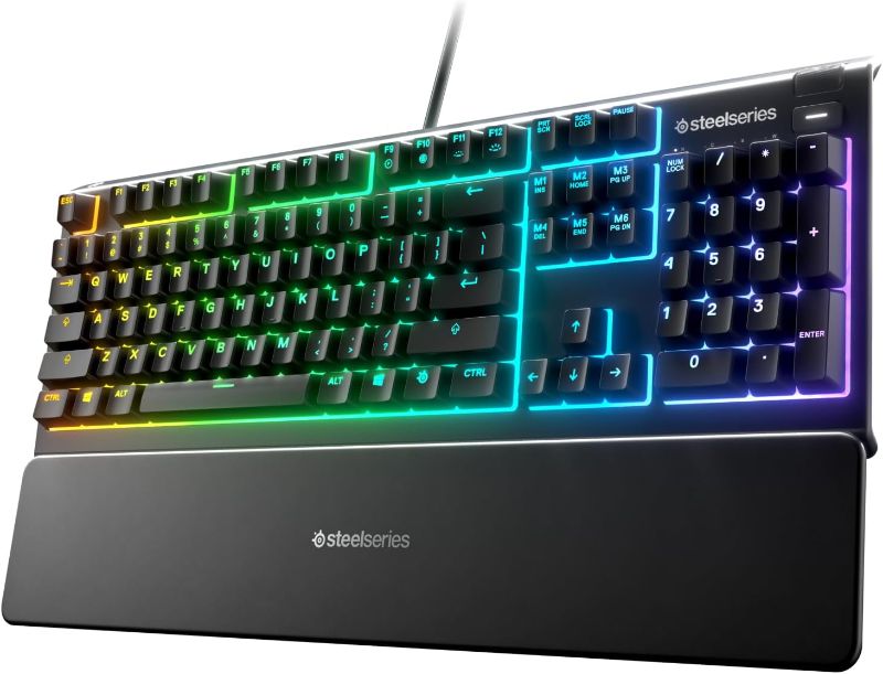 Photo 1 of SteelSeries Apex 3 RGB Gaming Keyboard – 10-Zone RGB Illumination – IP32 Water Resistant – Premium Magnetic Wrist Rest (Whisper Quiet Gaming Switch)
