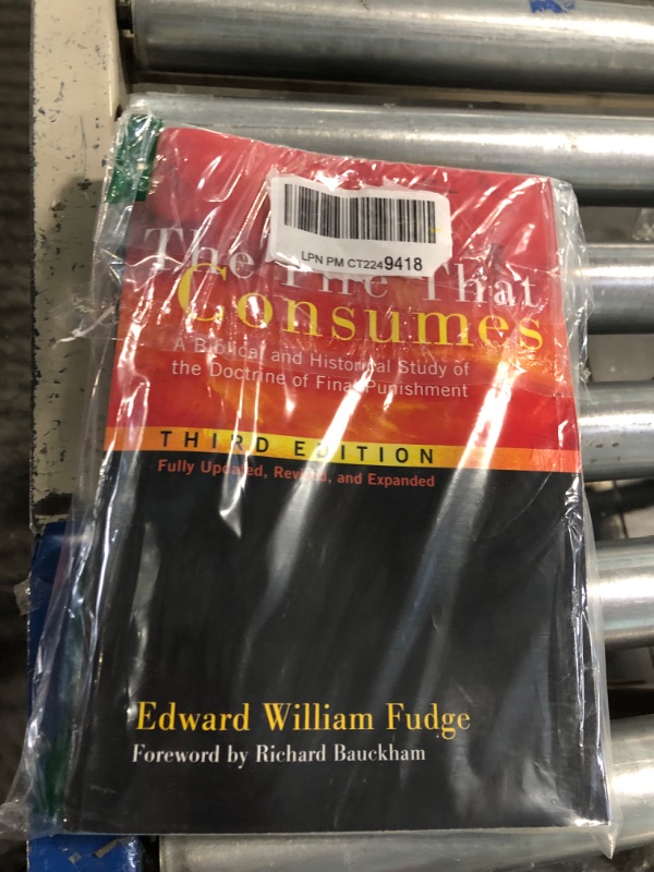 Photo 2 of The Fire That Consumes: A Biblical and Historical Study of the Doctrine of Final Punishment. 3rd edition, fully updated, revised and expanded Paperback – June 1, 2011
