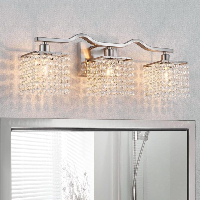 Photo 1 of WUZUPS 3-Light Bathroom Light Fixture Morden Vanity Wall Sconces Light Clear Crystal Drop for Bedroom Living Room, E12 Base, Nickel