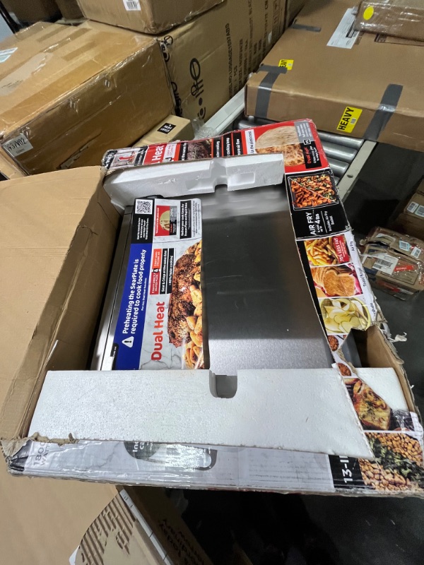 Photo 4 of Ninja SP301 Dual Heat Air Fry Countertop 13-in-1 Oven with Extended Height, XL Capacity, Flip Up & Away Capability for Storage Space, with Air Fry Basket, SearPlate, Wire Rack & Crumb Tray, Silver 13 Functions