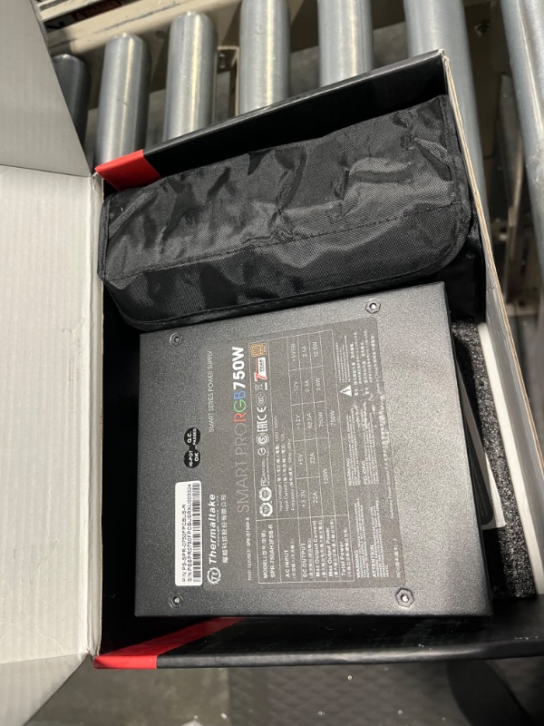 Photo 1 of Thermaltake Smart Pro RGB 750W Smart Zero Fan SLI/CrossFire Ready Continuous Power ATX12V v2.4 / EPS v2.92 80 PLUS Bronze Certified Full Modular Power Supply