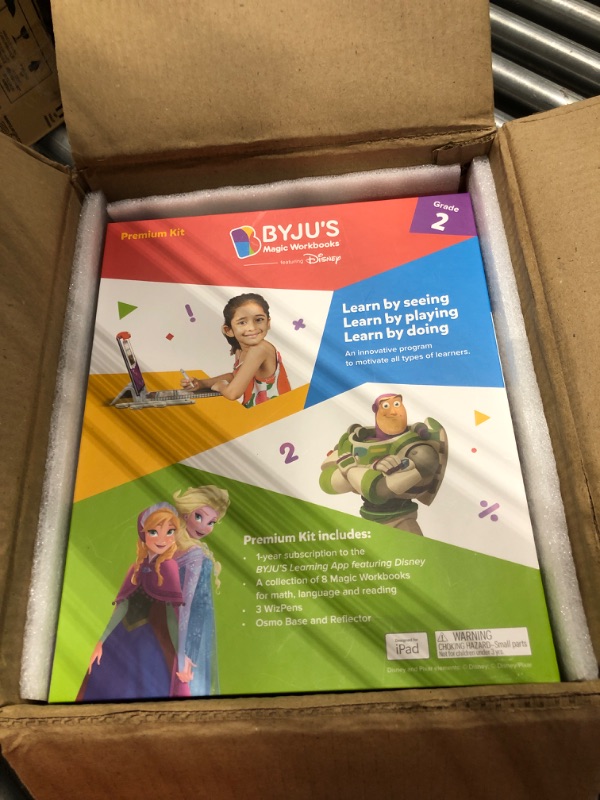 Photo 2 of BYJU’S Learning Kits: Disney, 2nd Grade Premium Edition (App + 8 Workbooks) Ages 6-8, Featuring Disney & Pixar Characters - Learn Grammar, Multiplication/Division & Writing - Osmo iPad Base Included iPad 2nd Grade