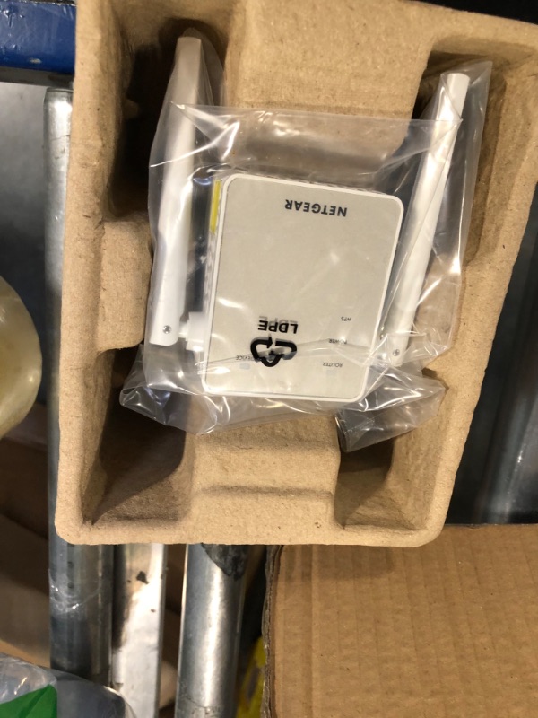 Photo 1 of NETGEAR Wi-Fi Range Extender EX6120 - Coverage Up to 1500 Sq Ft and 25 Devices with AC1200 Dual Band Wireless Signal Booster & Repeater (Up to 1200Mbps Speed), and Compact Wall Plug Design WiFi Extender AC1200