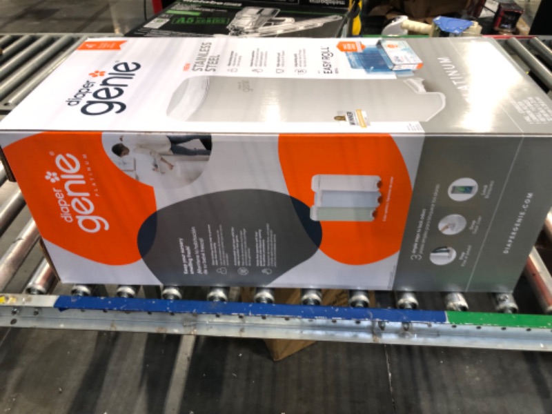 Photo 1 of Diaper Genie Platinum Pail (Stone Grey) is Made in Durable Stainless Steel and Includes 1 Easy Roll Refill with 18 Bags That can Last up to 5 Months.