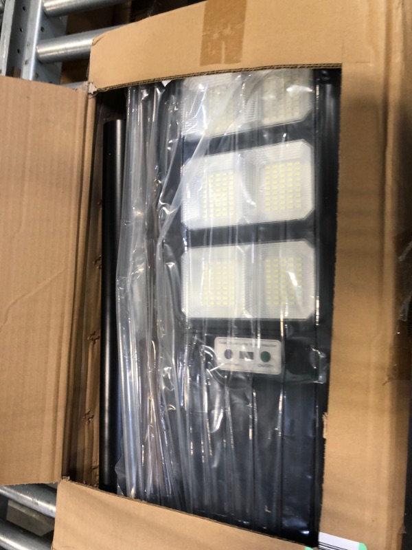 Photo 3 of A-ZONE 300W Solar Street Lights Outdoor Waterproof, 6500K 30000LM Outdoor LED Street Light Dusk to Dawn, LED Wide Angle Lamp with Motion Sensor and Remote Control, for Parking Lot, Yard, etc.