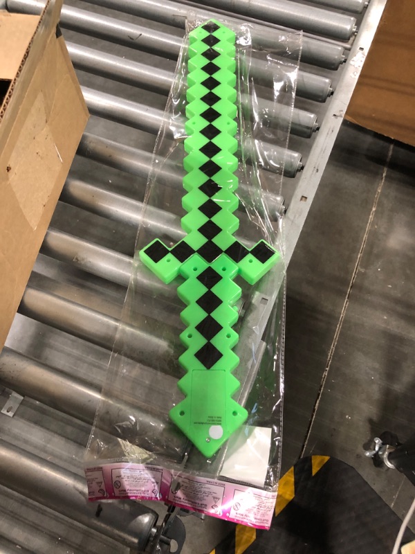 Photo 2 of Fun Central LED Light Up Pixel 8-Bit Toy Sword for Kids - Green