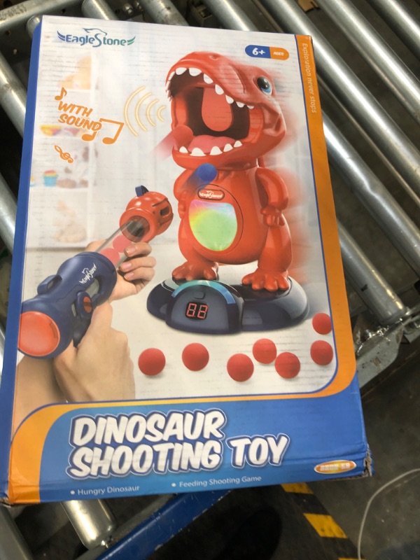 Photo 2 of Eaglestone Movable Dinosaur Shooting Toys for Kids, Boy Toys Shooting Games with 2 Air Pump Gun, Score Record, LED & Sound, 48 Foam Balls Electronic Target, Christmas Toys Gift for Boys and Girls