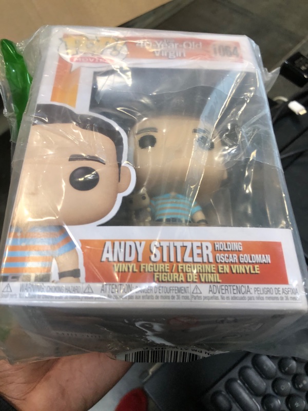 Photo 2 of Funko Pop! Movies: 40 Year Old Virgin - Andy Holding Oscar (Styles May Vary)