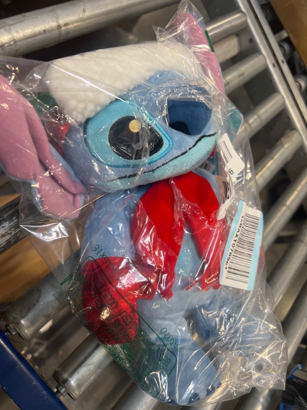 Photo 2 of Disney Stitch Holiday Dancing Feature Plush with Music, Officially Licensed Kids Toys for Ages 3 Up by Just Play
