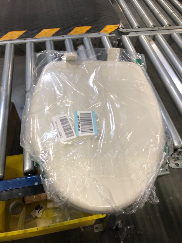 Photo 1 of Kohler K-20111-96 Brevia Round Toilet Seat with Grip-Tight Bumpers, Quiet-Close Seat, Quick-Attach Hardware, Biscuit Biscuit Round Toilet Seat
