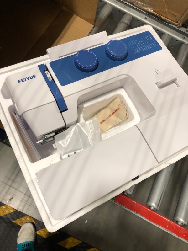 Photo 1 of FEIYUE FYe310 Domestic Sewing Machine with Servo Motor, Controllable Speed, Stabilized Stitch, 105 Stitch Applications, Dual LED Lights (Blue)
