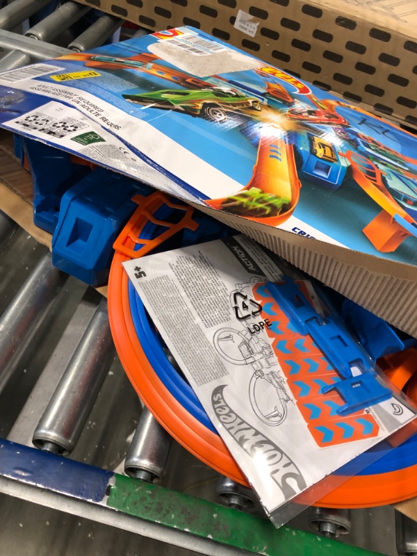 Photo 3 of Hot Wheels Track Set with 1:64 Scale Toy Car, 4 Intersections for Crashing, Powered by a Motorized Booster, Criss-Cross Crash Track????