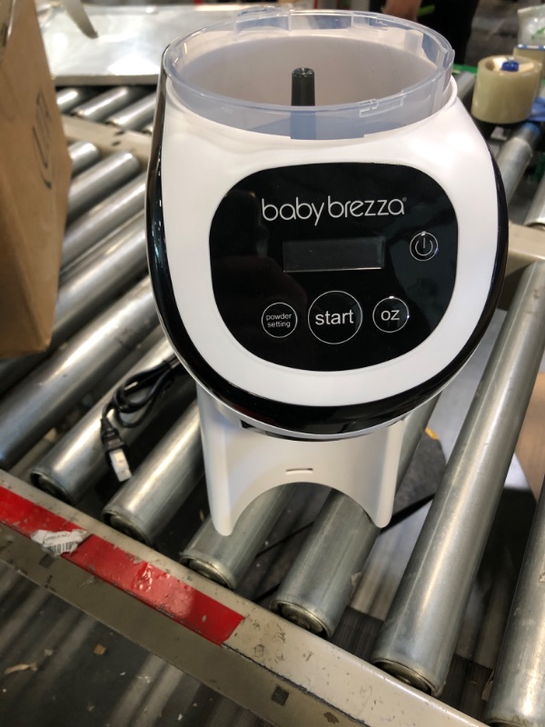 Photo 4 of Baby Brezza Formula Pro Mini Baby Formula Maker – Small Baby Formula Mixer Machine Fits Small Spaces and is Portable for Travel– Bottle Makers Makes The Perfect Bottle for Your Infant On The Go, White
